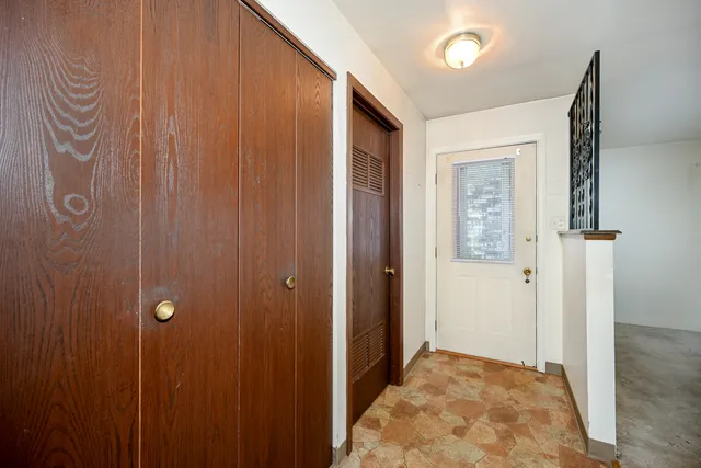 a view of elevator with hallway