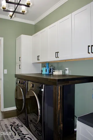 a spacious bedroom with a bed and a couch