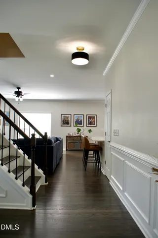 a kitchen with stainless steel appliances a refrigerator sink and cabinets