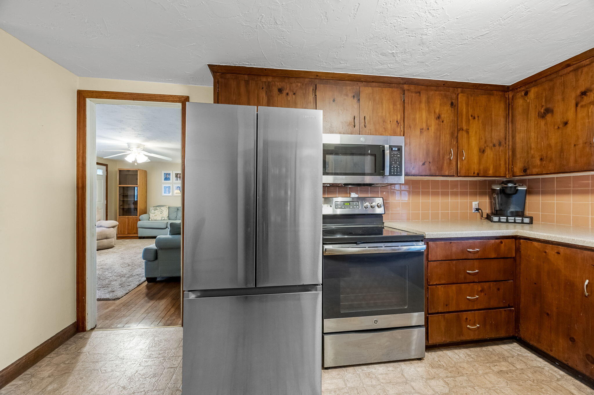 21 Princes Street Harwich, MA 02645 - Photo 9 of 30 a kitchen with a refrigerator and a sink