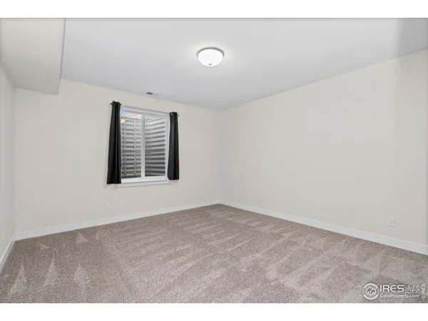 a kitchen with a sink cabinets and stainless steel appliances