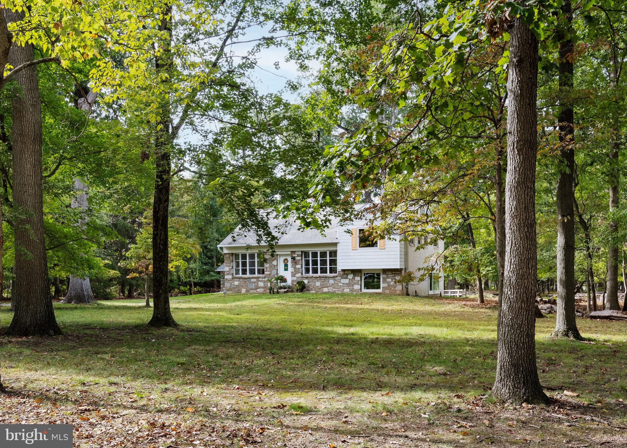 a view of a house with a big yard