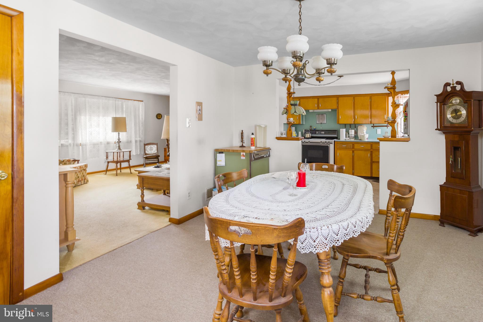 32 Hartman Drive Hamilton, NJ 08690 - Photo 12 of 23 a dining room with furniture and chandelier