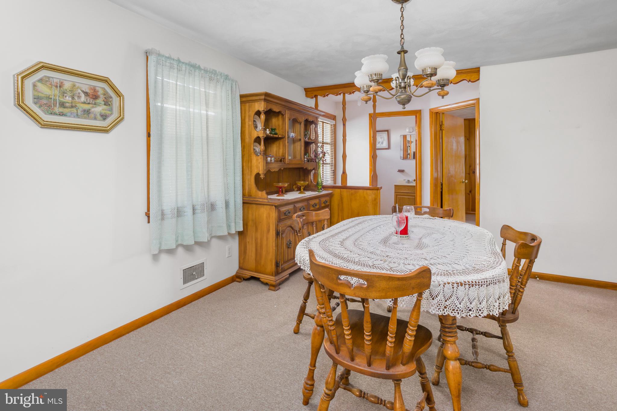 32 Hartman Drive Hamilton, NJ 08690 - Photo 13 of 23 a dining room with a table and chairs