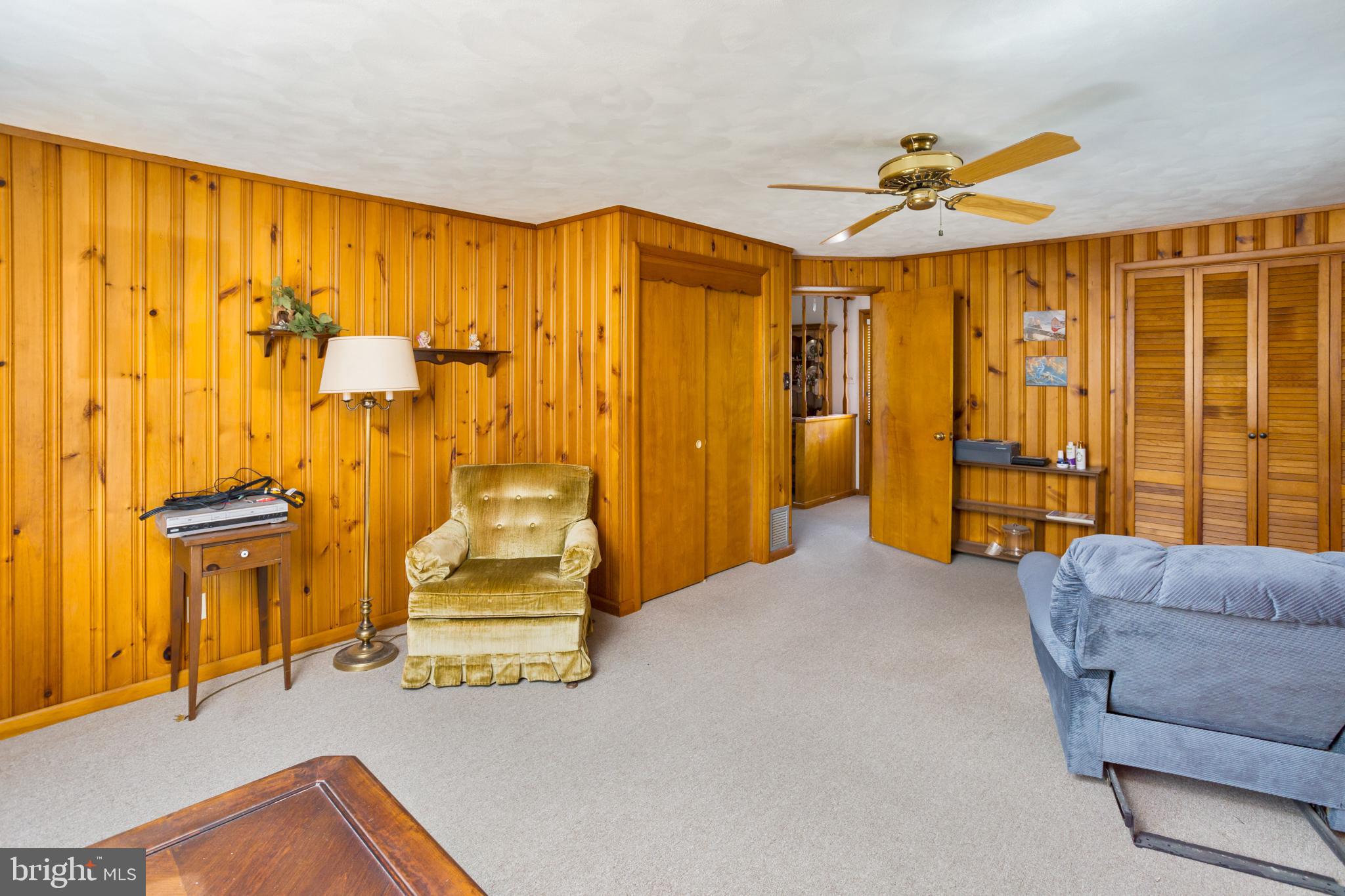 32 Hartman Drive Hamilton, NJ 08690 - Photo 15 of 23 a bedroom with a bed and a chandelier