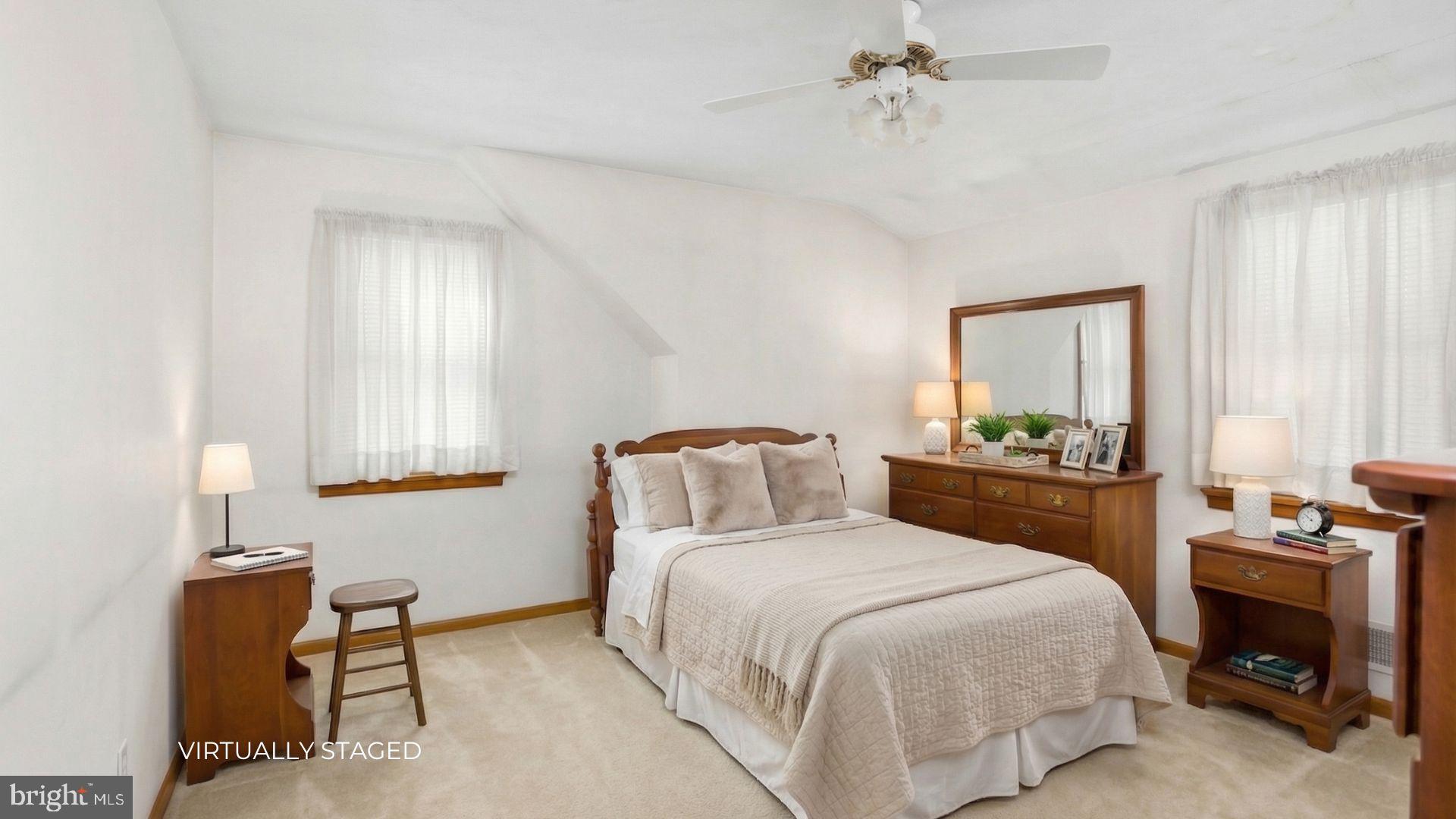 32 Hartman Drive Hamilton, NJ 08690 - Photo 17 of 23 a bedroom with a bed and a window