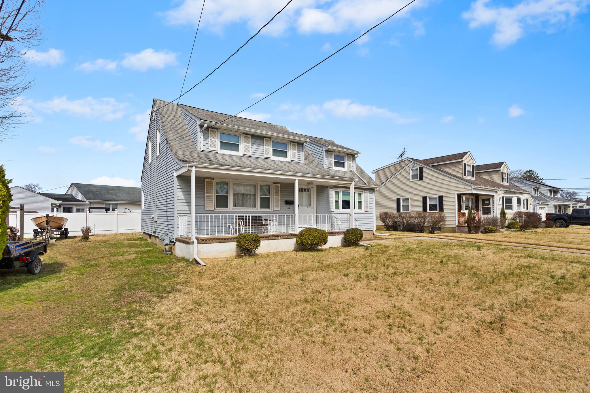 32 Hartman Drive Hamilton, NJ 08690 - Photo 2 of 23 a front view of a house with swimming pool