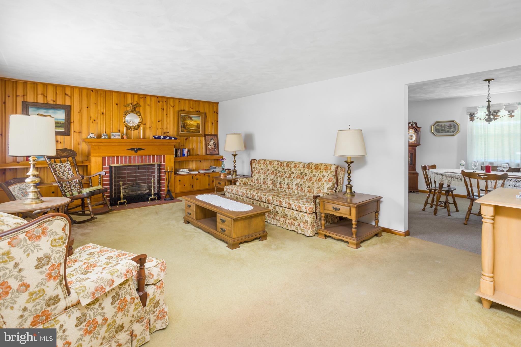 32 Hartman Drive Hamilton, NJ 08690 - Photo 8 of 23 a living room with furniture and a large window