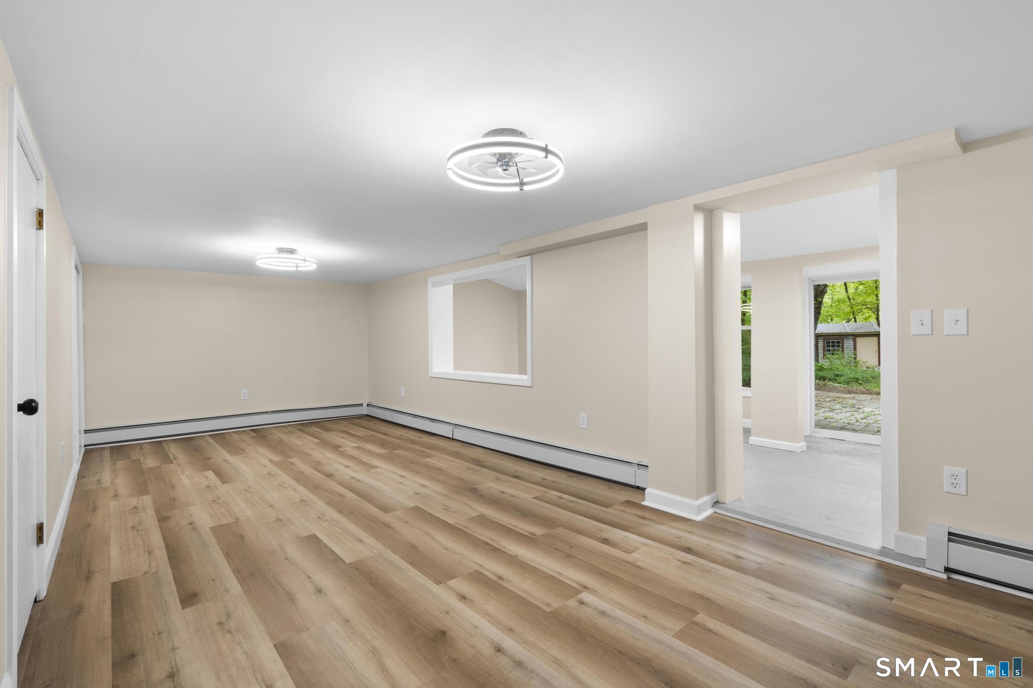 7 Sycamore Terrace Windham, CT 06280 - Photo 30 of 40 a view of an empty room with a window