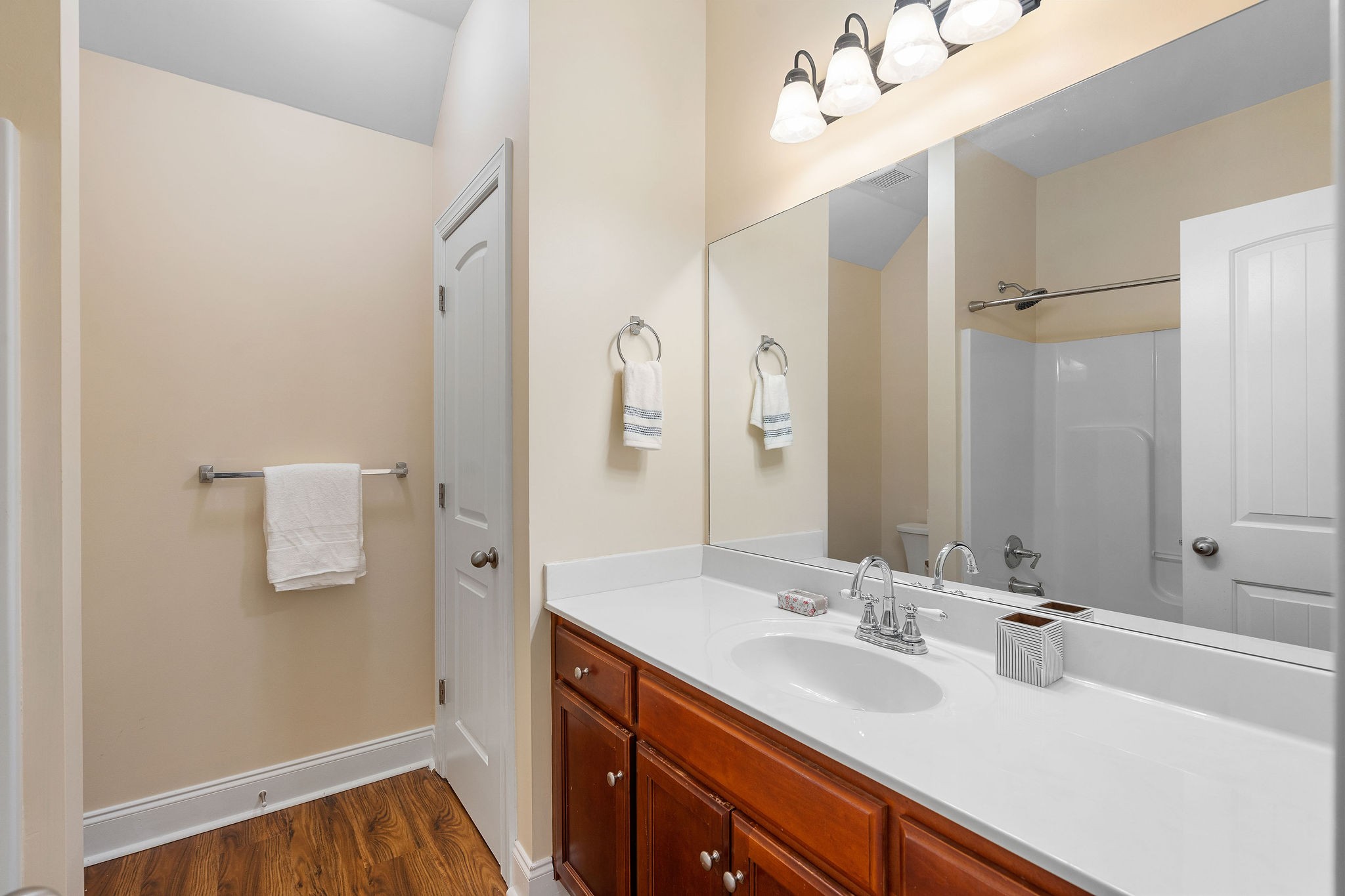 316 Rowlette Circle Murfreesboro, TN 37127 - Photo 14 of 25 a bathroom with a sink a mirror and shower