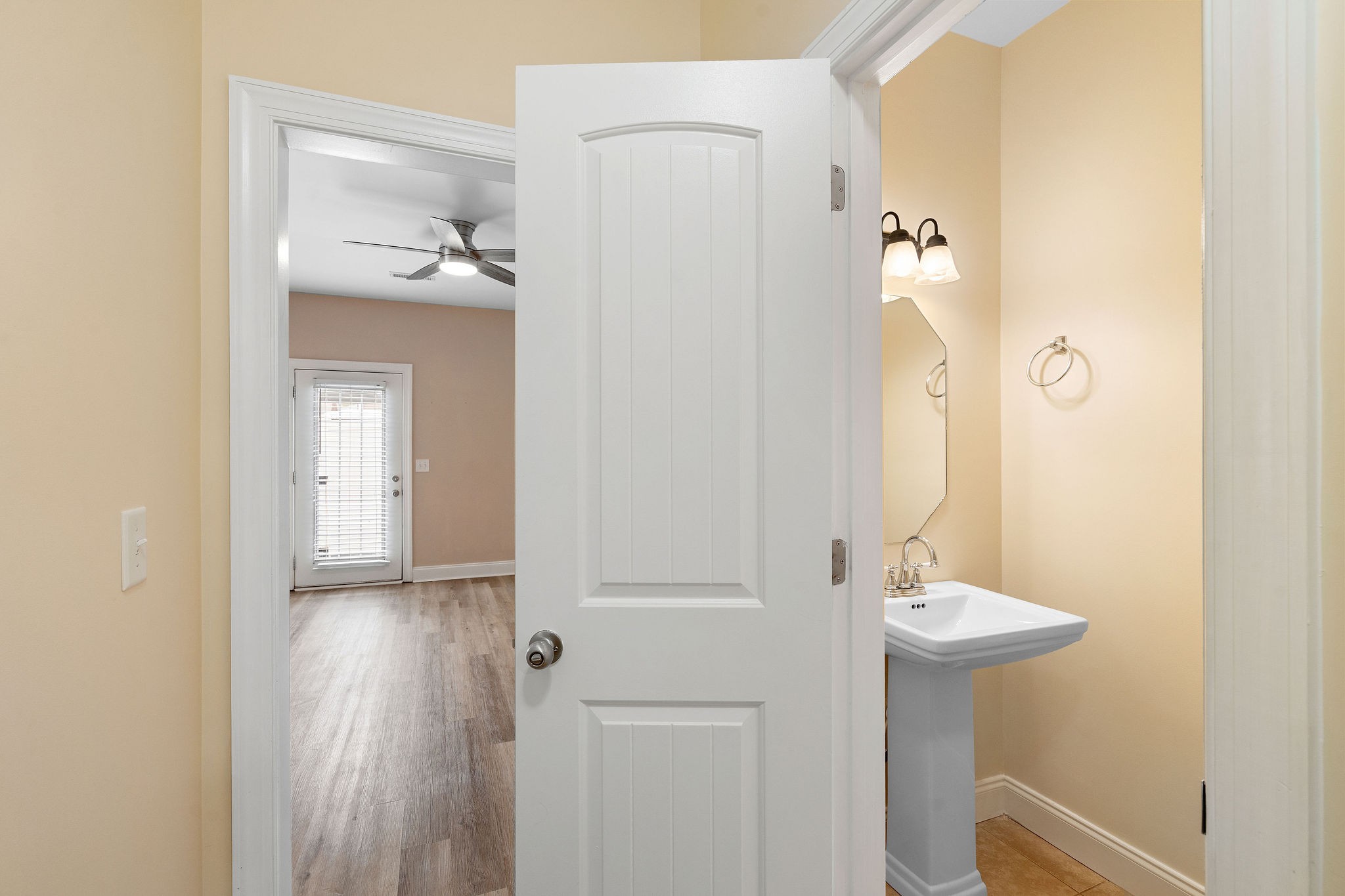 316 Rowlette Circle Murfreesboro, TN 37127 - Photo 3 of 25 a bathroom with a sink and mirror