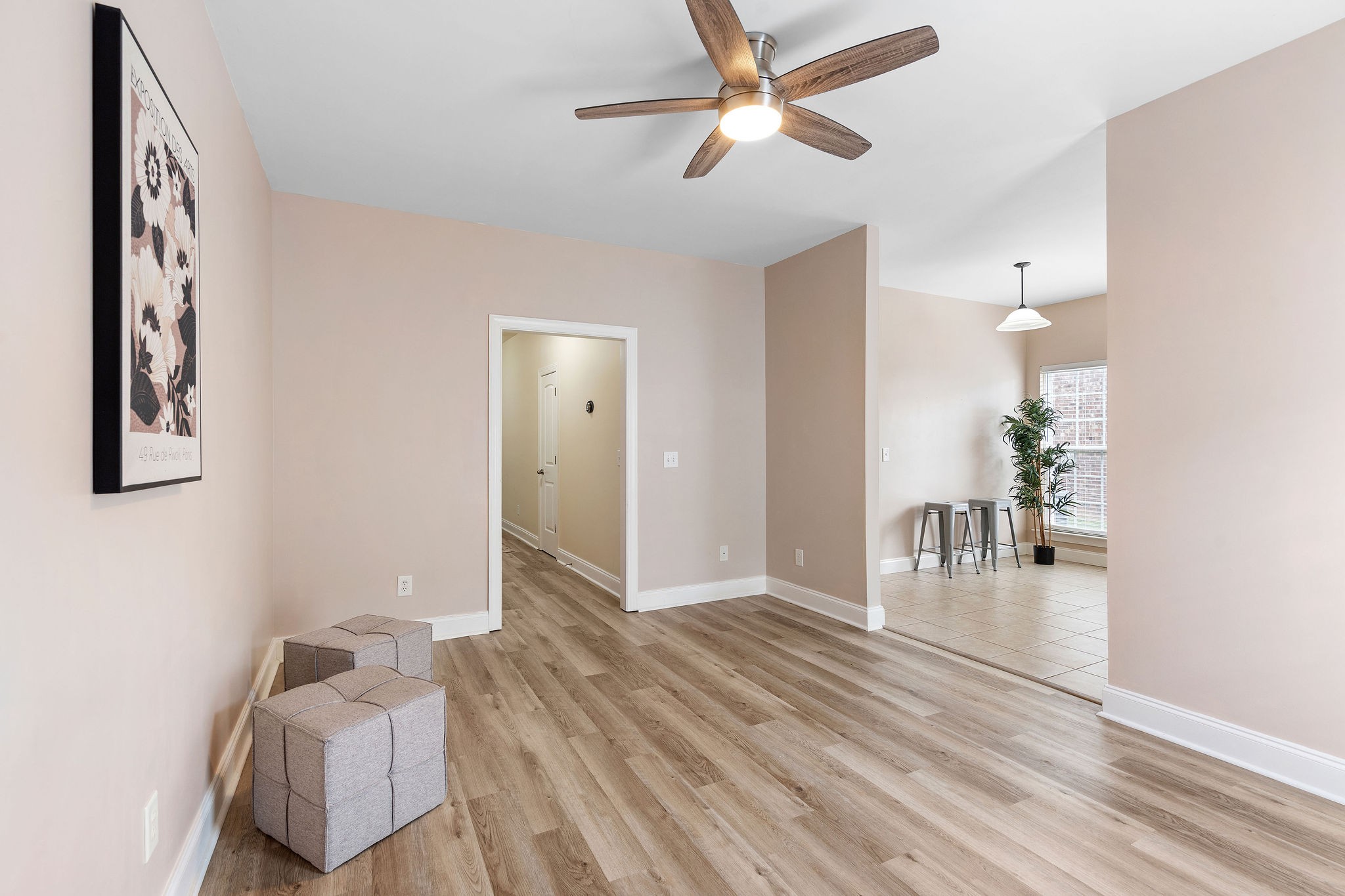 316 Rowlette Circle Murfreesboro, TN 37127 - Photo 5 of 25 a hallway with a bed and a chandelier