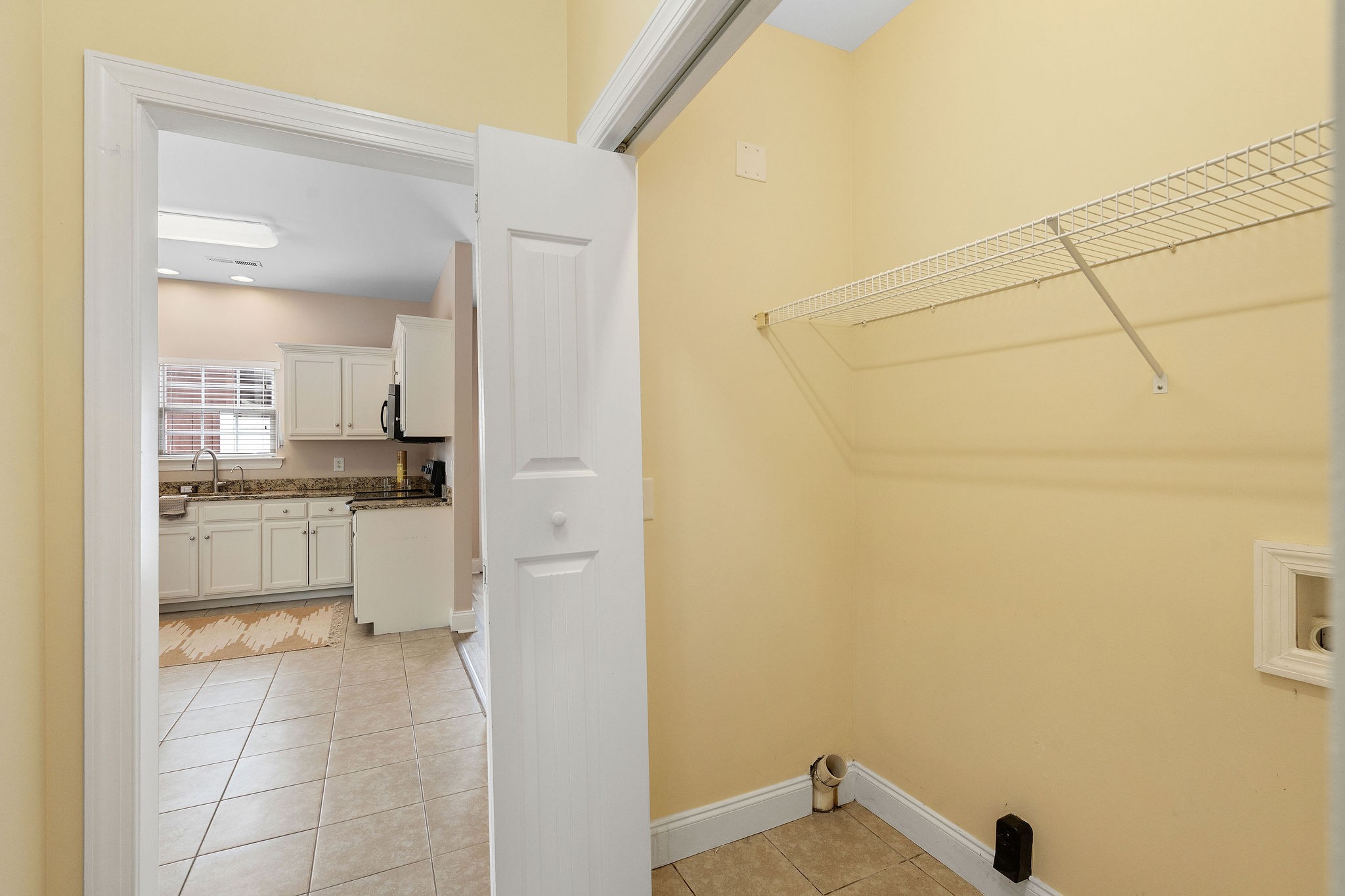 316 Rowlette Circle Murfreesboro, TN 37127 - Photo 9 of 25 a kitchen with white cabinets and white appliances