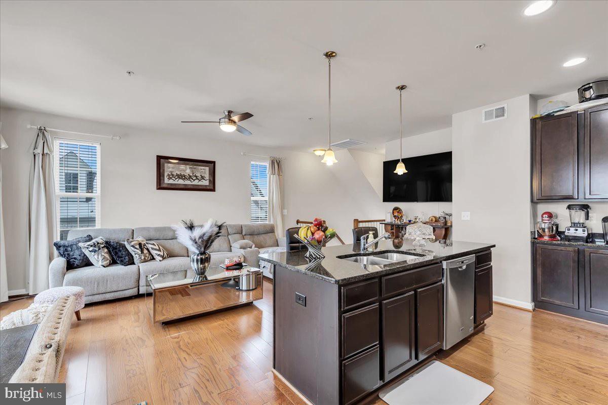 49 Steeplechase Drive La Plata, MD 20646 - Photo 15 of 27 a living room with furniture and a flat screen tv