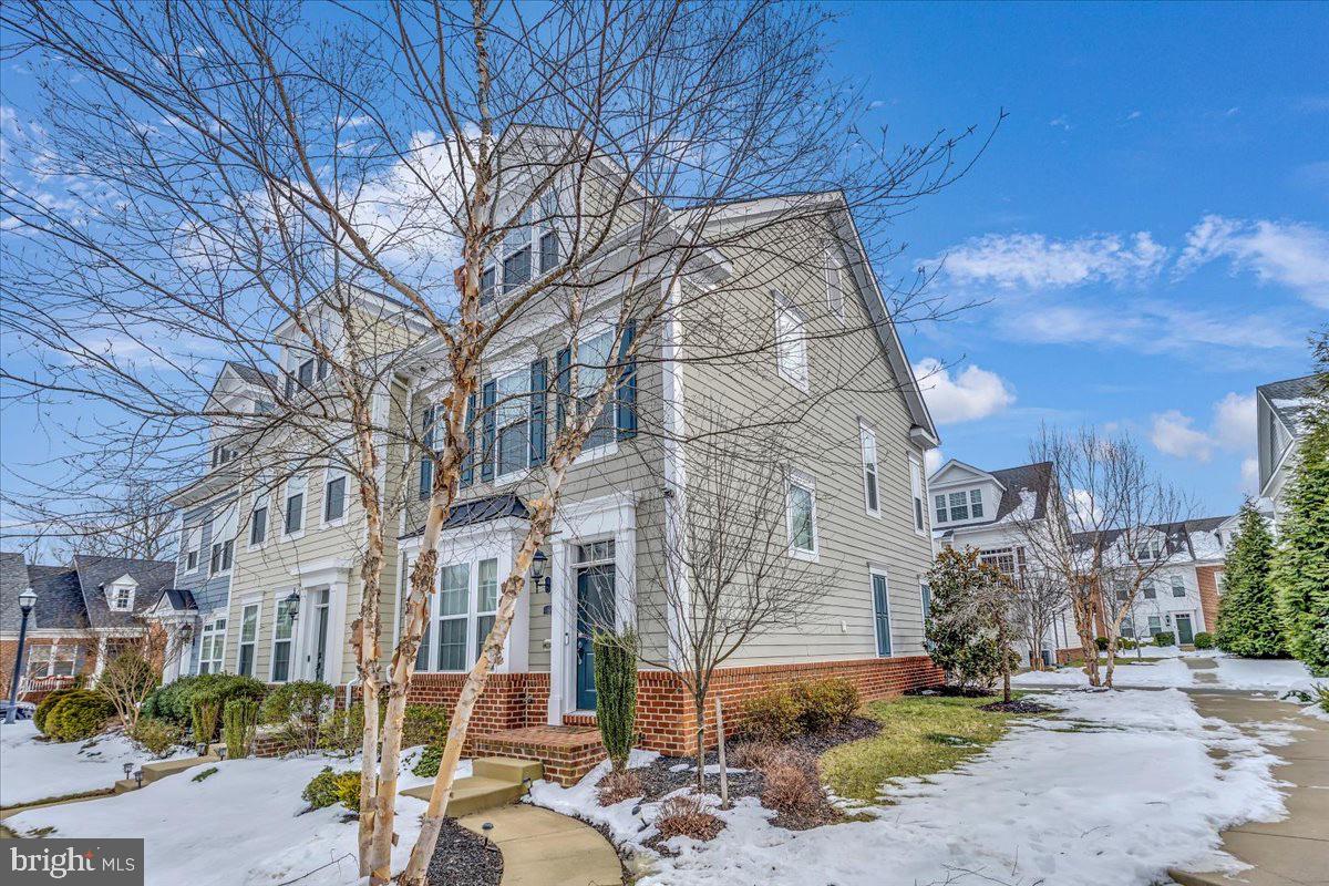 49 Steeplechase Drive La Plata, MD 20646 - Photo 2 of 27 a city street lined with buildings and trees