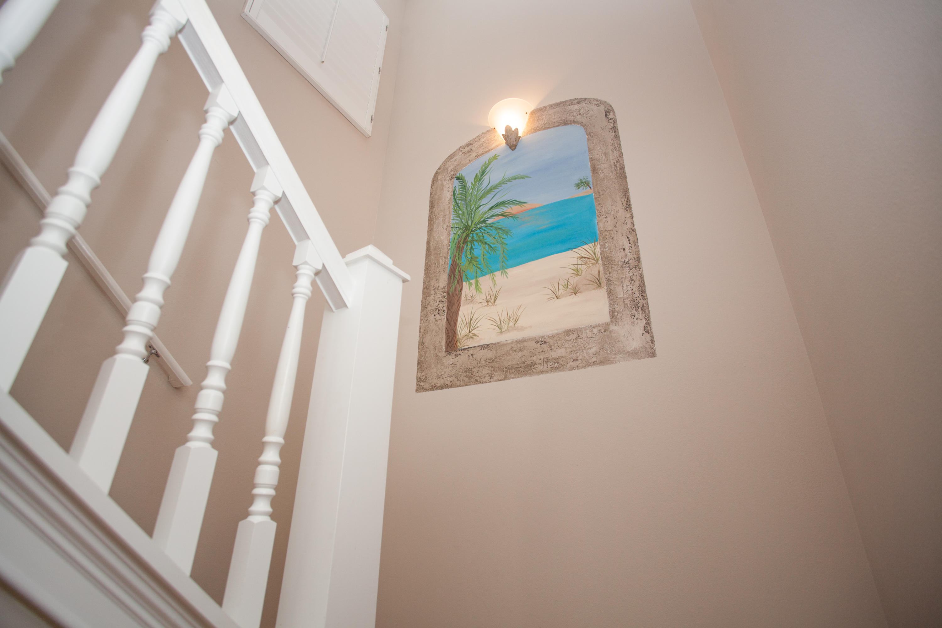 180 Masters Court Santa Rosa Beach, FL 32459 - Photo 17 of 30 Stairwell with painted mural