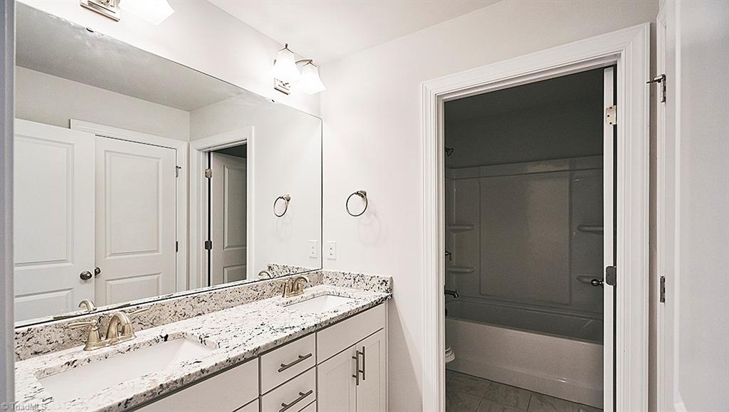 2077 Spring Wind Road, Unit 179 Pfafftown, NC 27040 - Photo 2 of 23 Photos are similar to finishes that will be in this home.