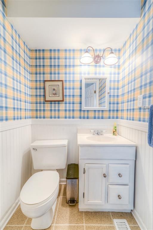 279 Shafer Road Coraopolis, PA 15108 - Photo 12 of 25 The cheerful first floor powder room is convenient for guests.