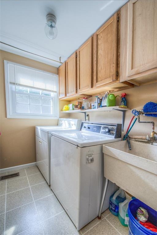 279 Shafer Road Coraopolis, PA 15108 - Photo 13 of 25 The first floor laundry room off the kitchen makes doing laundry a breeze. No more running up and down those basement steps.