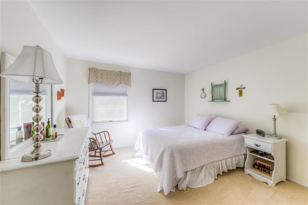 279 Shafer Road Coraopolis, PA 15108 - Photo 19 of 25 The fourth bedroom, though one of the smaller bedrooms, still has plenty of room for a full suite of bedroom furniture plus a seating area. There's also a large closet.