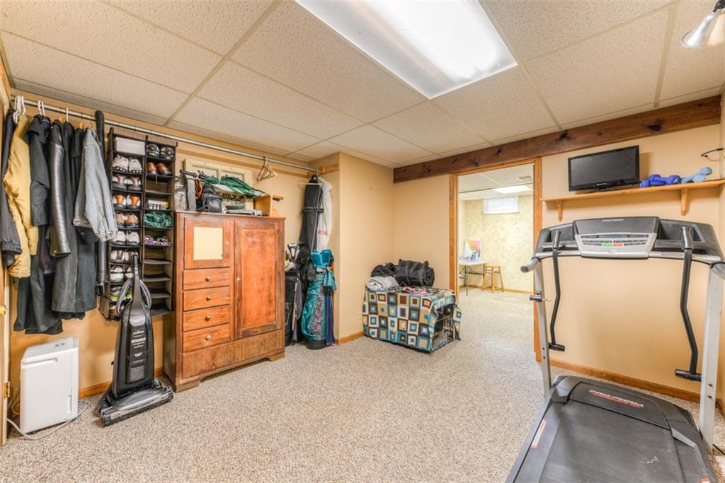 279 Shafer Road Coraopolis, PA 15108 - Photo 21 of 25 The finished basement is currently divided into two rooms. The first is a convenient place for exercise and storage.