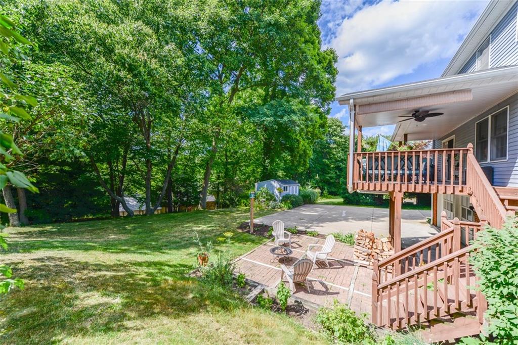 279 Shafer Road Coraopolis, PA 15108 - Photo 23 of 25 In addition to the large driveway, storage shed, fire pit area, and deck seating, the well-maintained backyard still offers plenty of yard space for playing games and hosting parties!