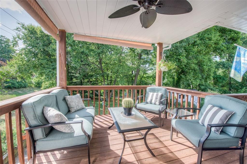 279 Shafer Road Coraopolis, PA 15108 - Photo 24 of 25 The covered seating area on the deck overlooks the serene yard.
