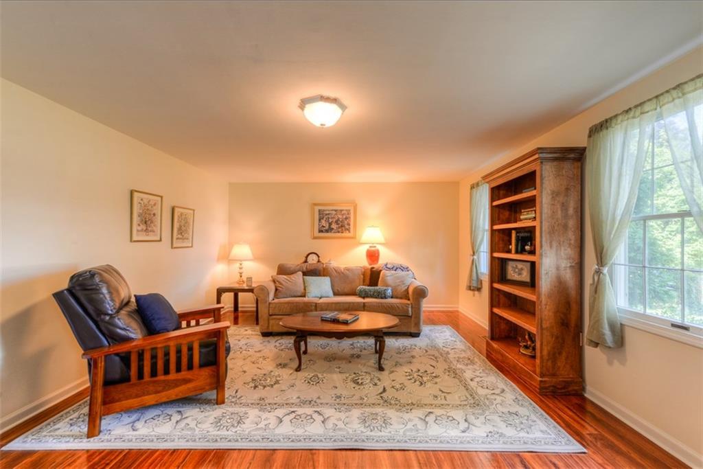 279 Shafer Road Coraopolis, PA 15108 - Photo 4 of 25 The formal living room easily accommodates large furniture and accent pieces to create a warm and comfortable place to welcome you home at night.