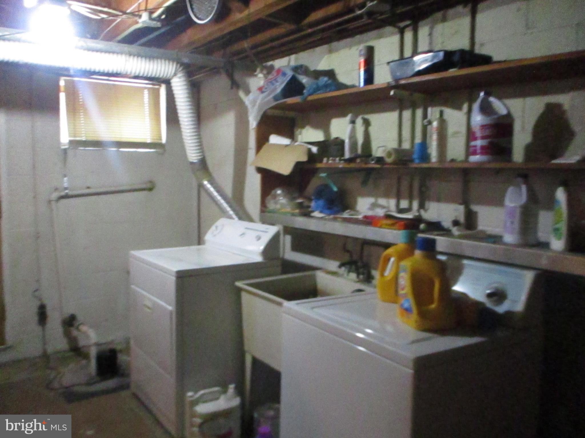 5233 Fredcrest Road Baltimore, MD 21229 - Photo 23 of 33 Laundry Area/Sump pump