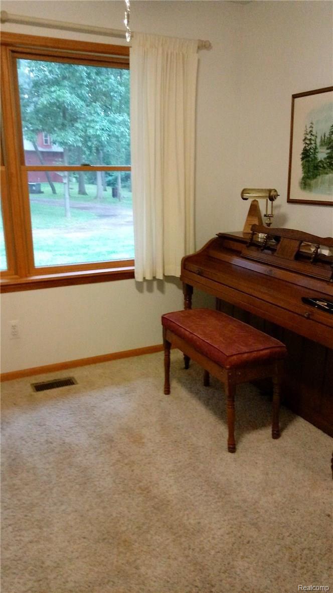 2825 Burden Road Stockbridge, MI 49285 - Photo 32 of 62 Bonus room for an office/den with view of the pole barn.