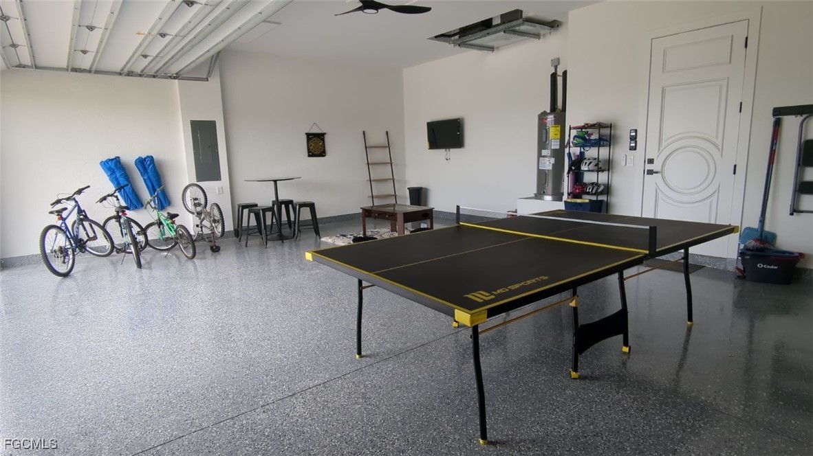 308 Southwest 13th Court Cape Coral, FL 33991 - Photo 14 of 15 a living room with furniture a rug and white walls