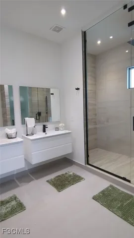 a bathroom with a bathtub and a sink