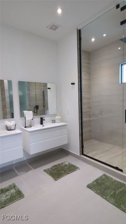 308 Southwest 13th Court Cape Coral, FL 33991 - Photo 8 of 15 a bathroom with a bathtub and a sink