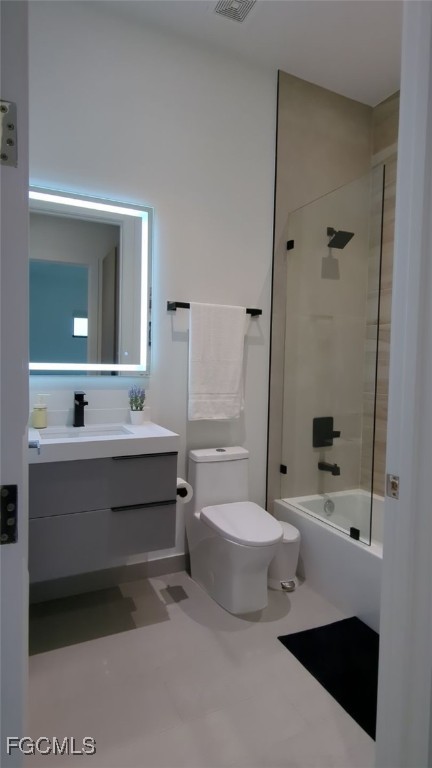 308 Southwest 13th Court Cape Coral, FL 33991 - Photo 9 of 15 a bathroom with a sink a toilet and bathtub