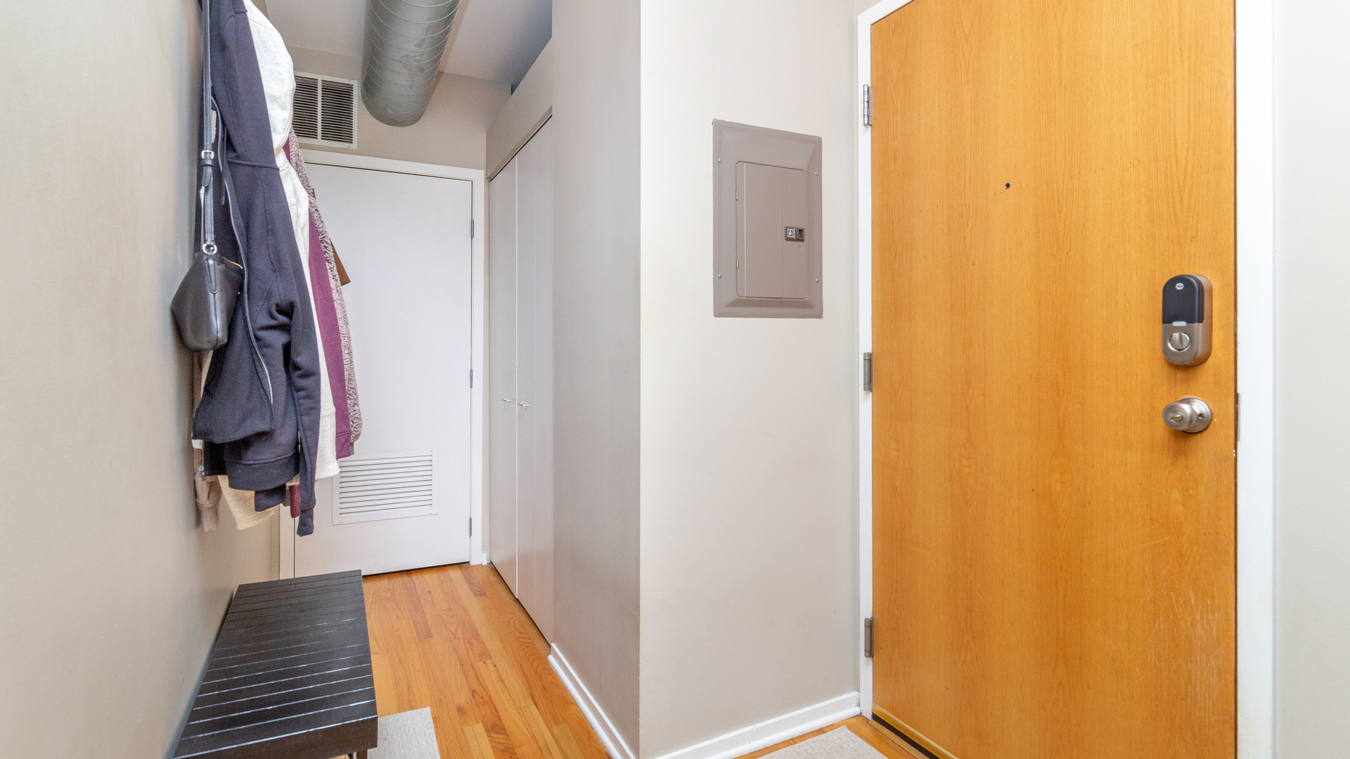 811 South Lytle Street, Unit 319 Chicago, IL 60607 - Photo 15 of 29 a view of walk in closet with clothes and shoes