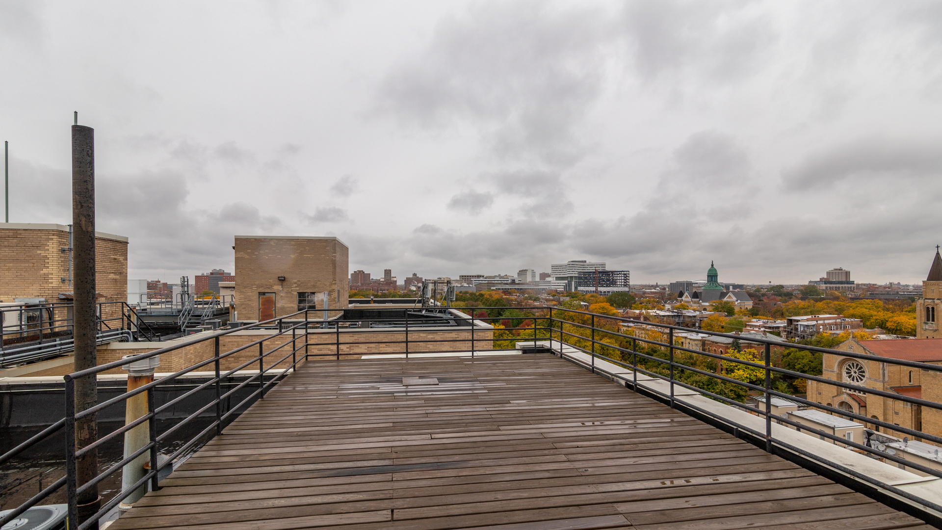 811 South Lytle Street, Unit 319 Chicago, IL 60607 - Photo 25 of 29 a view of a balcony with wooden floor