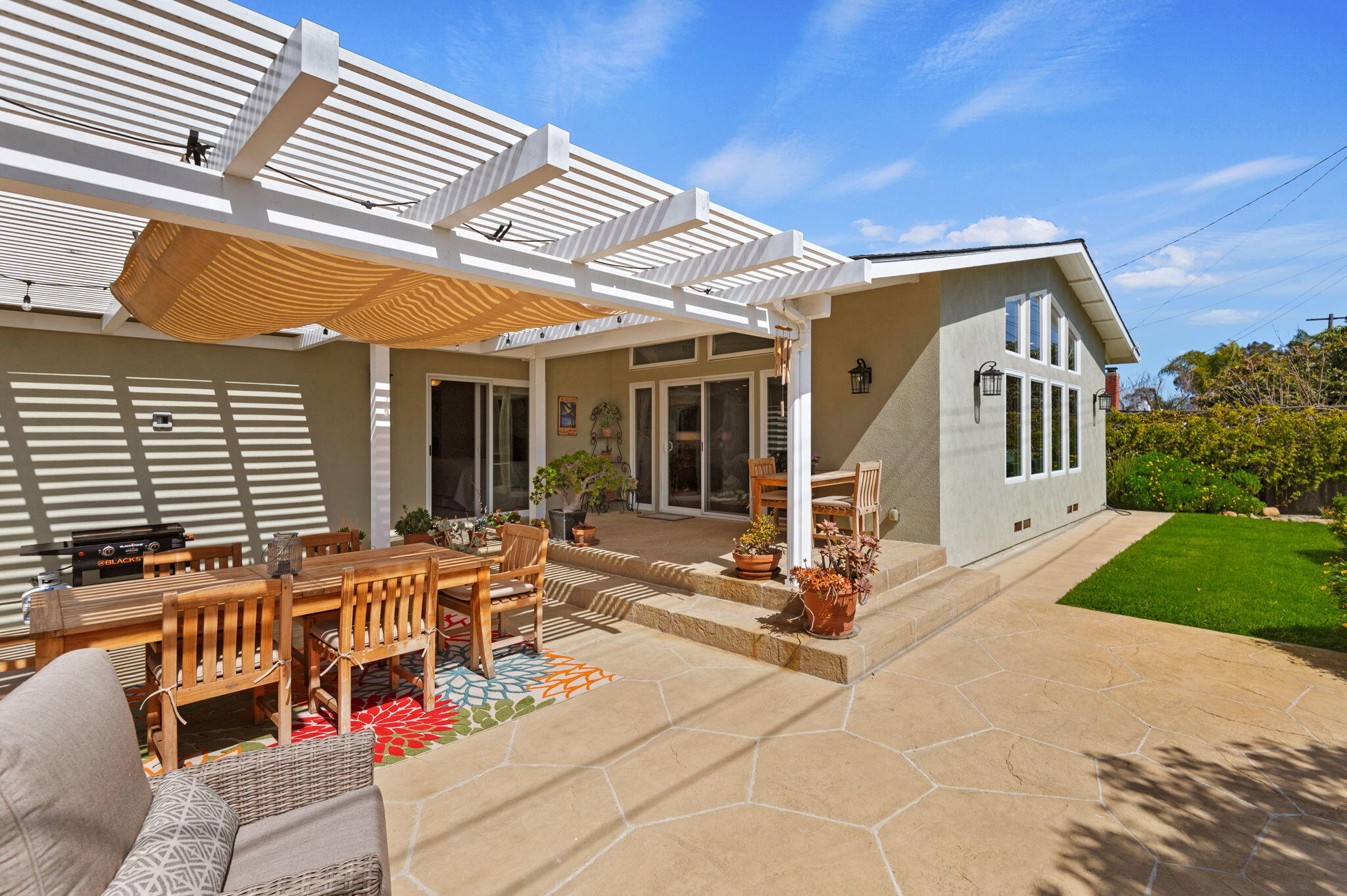 7635 Anchor Drive Goleta, CA 93117 - Photo 17 of 24 a view of a house with backyard porch and porch