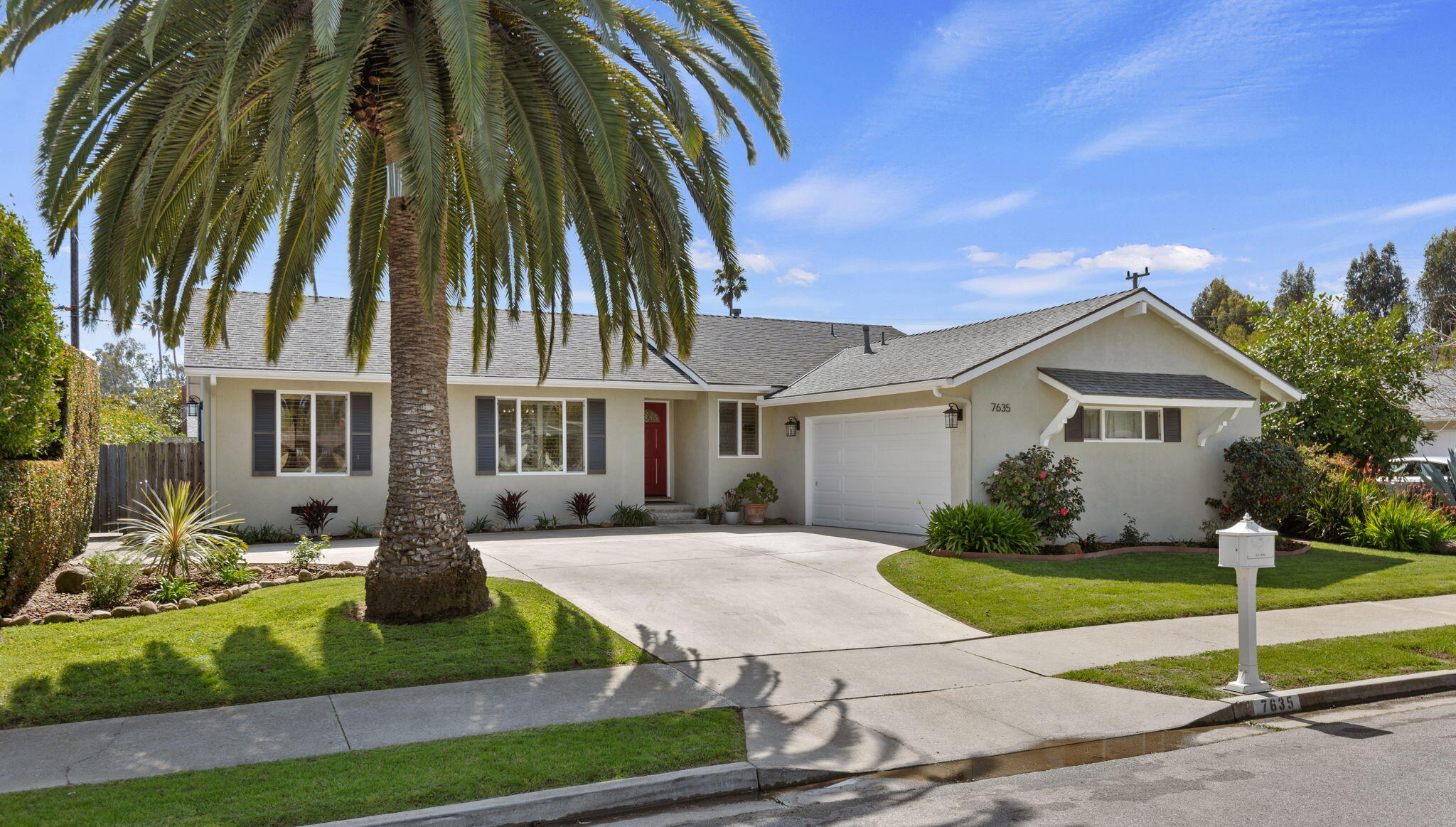 7635 Anchor Drive Goleta, CA 93117 - Photo 2 of 24 a front view of a house with a yard