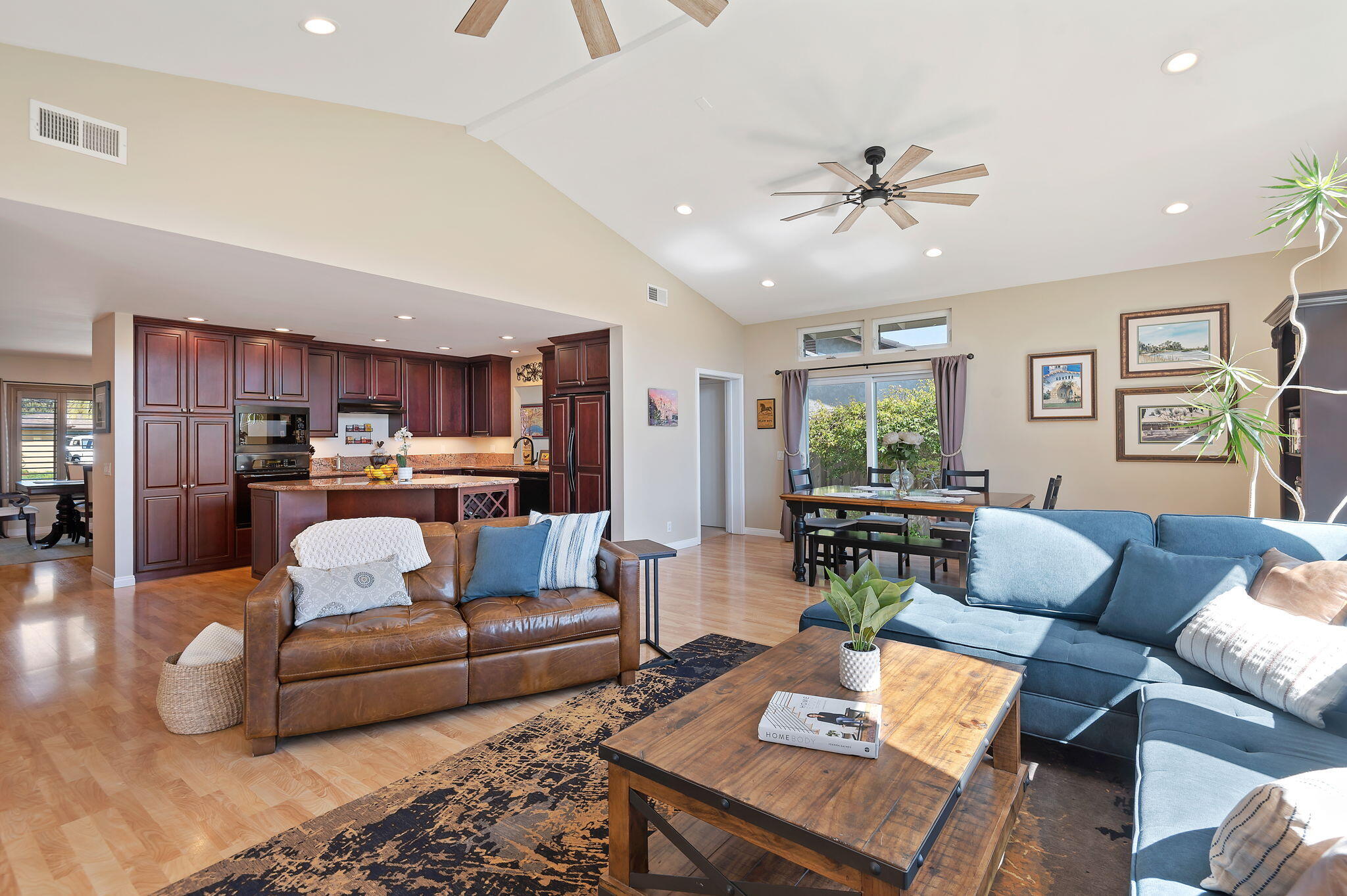 7635 Anchor Drive Goleta, CA 93117 - Photo 4 of 24 a living room with furniture and kitchen view