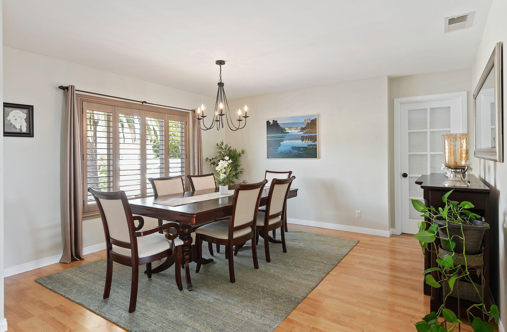 7635 Anchor Drive Goleta, CA 93117 - Photo 7 of 24 a view of a dining room with furniture window and wooden floor