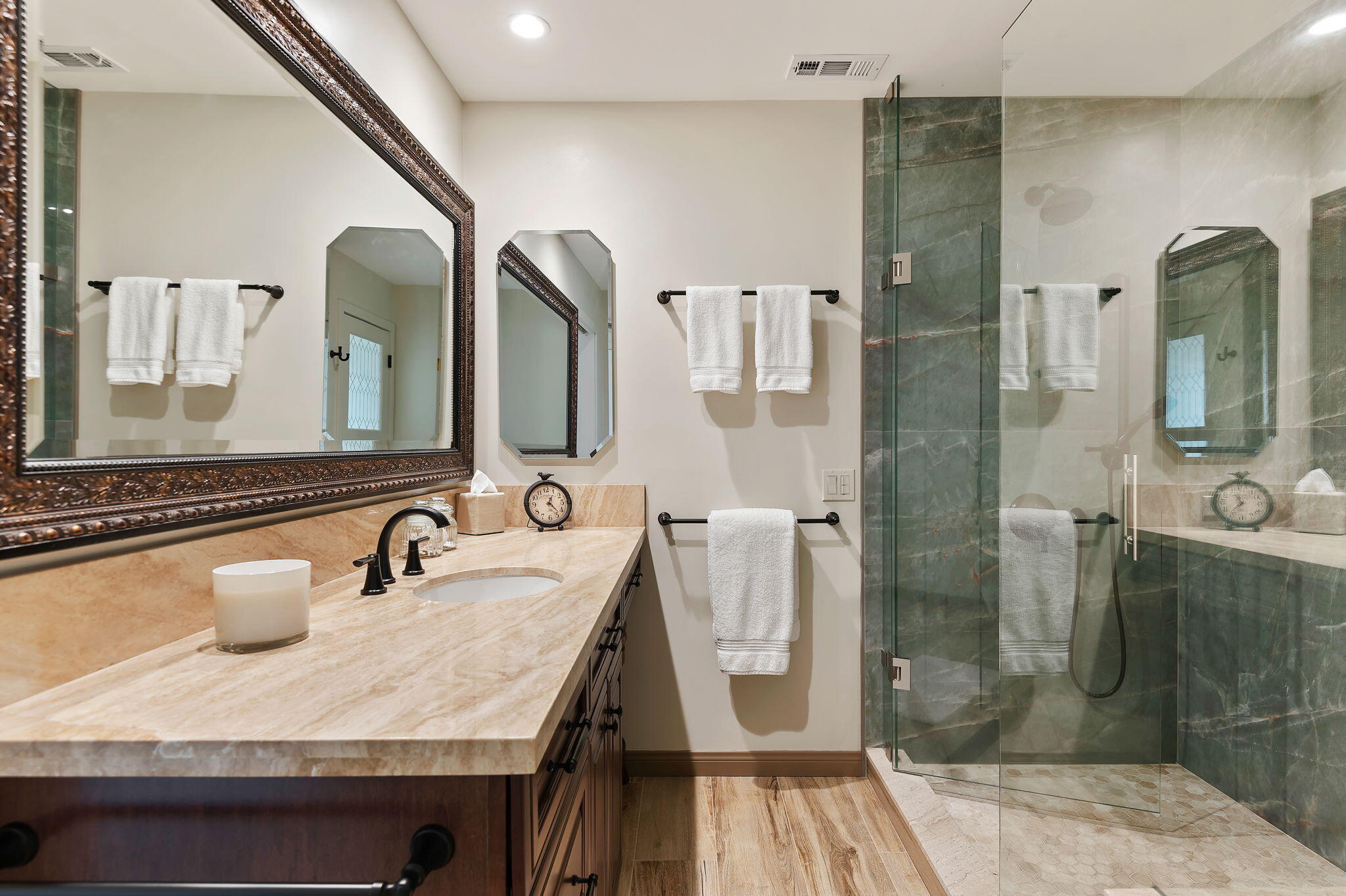 7635 Anchor Drive Goleta, CA 93117 - Photo 10 of 24 a bathroom with a sink and mirror