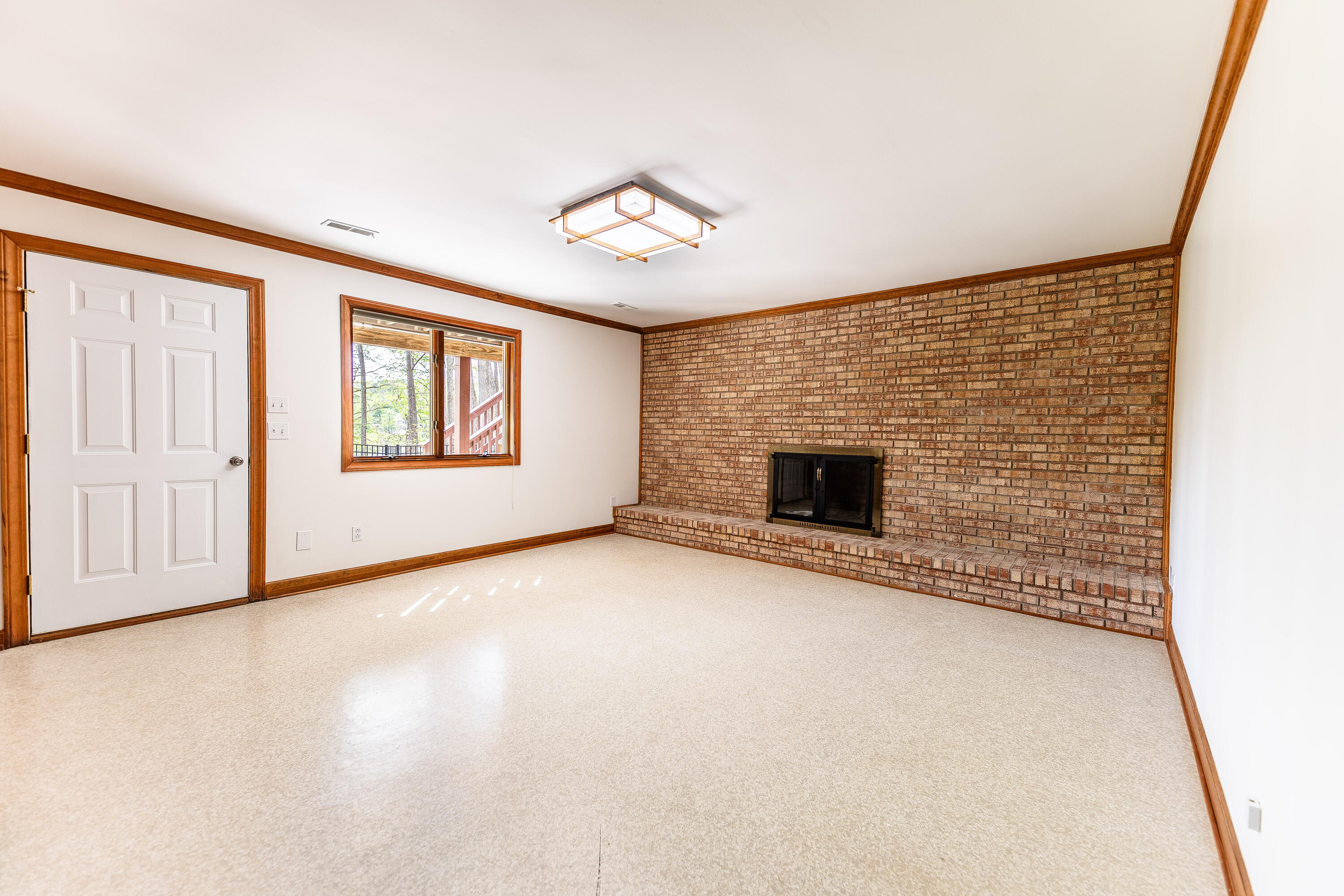 415 Santee Drive Santee, SC 29142 - Photo 22 of 39 Family Room Lower Level with Fireplace