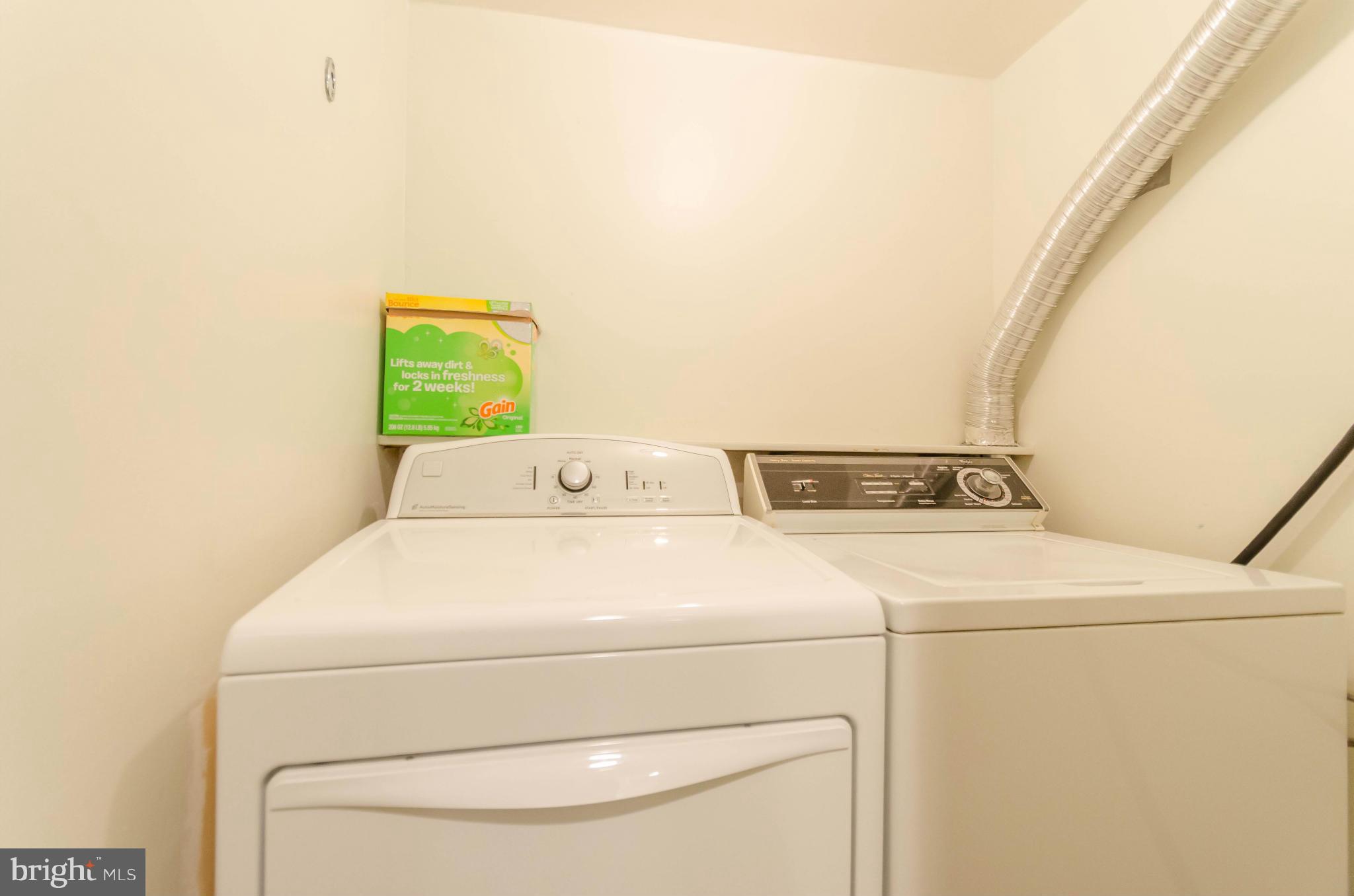 111 Hamlet Hill Road, Unit 606 Baltimore, MD 21210 - Photo 16 of 22 a utility room with dryer and washer
