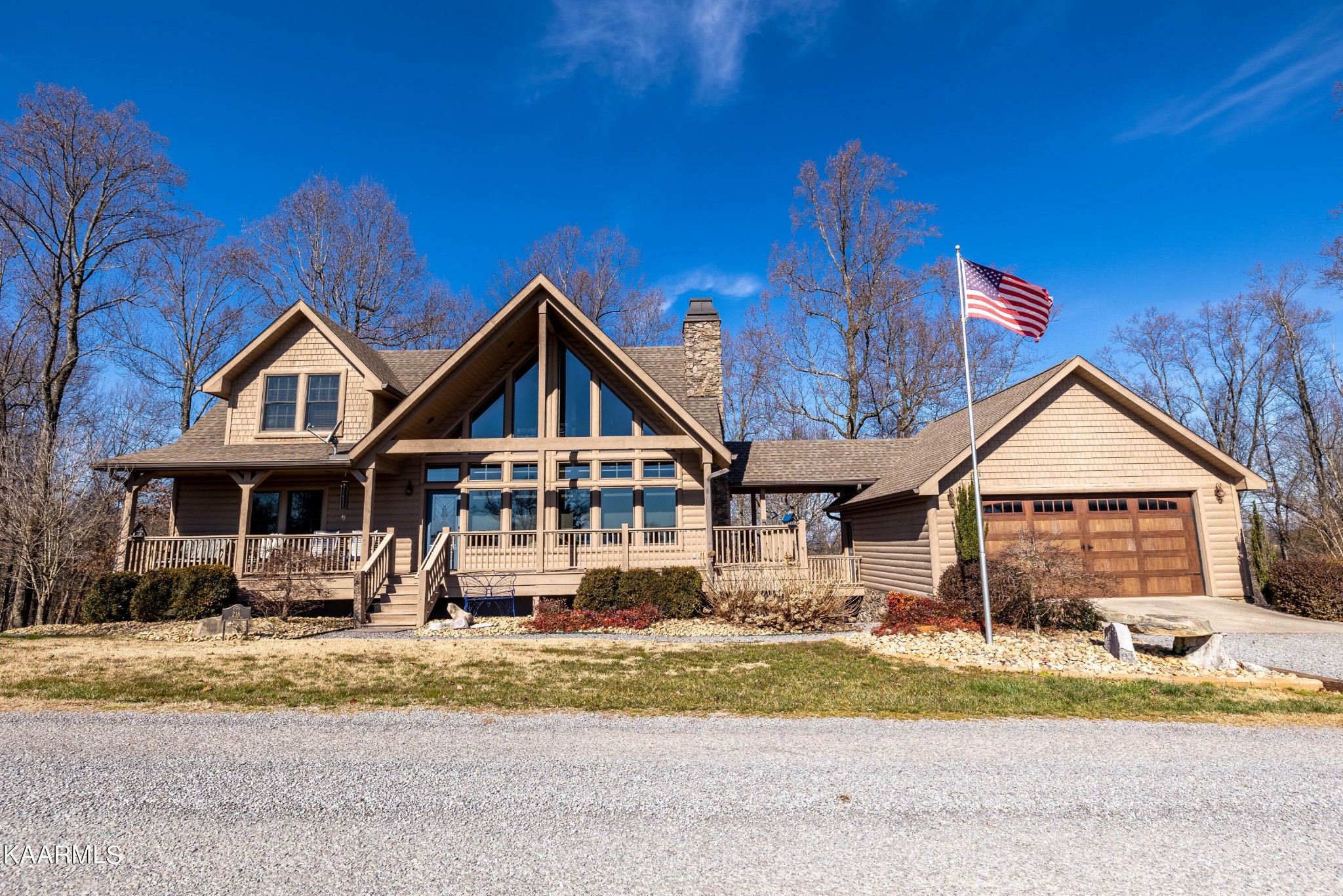 216 Meadow Road Friendsville, TN 37737 - Photo 3 of 57 a front view of a house with a yard