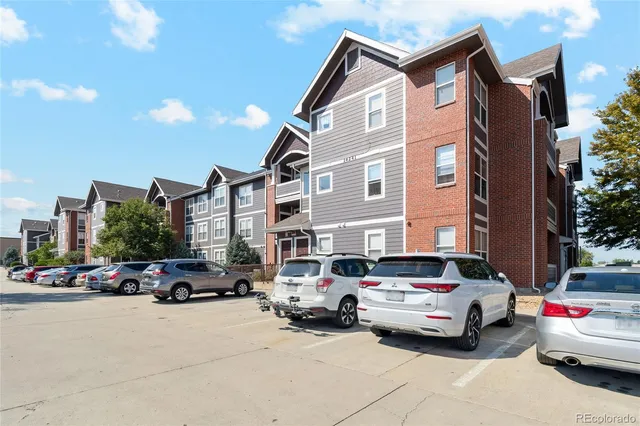 a car parked in front of a building