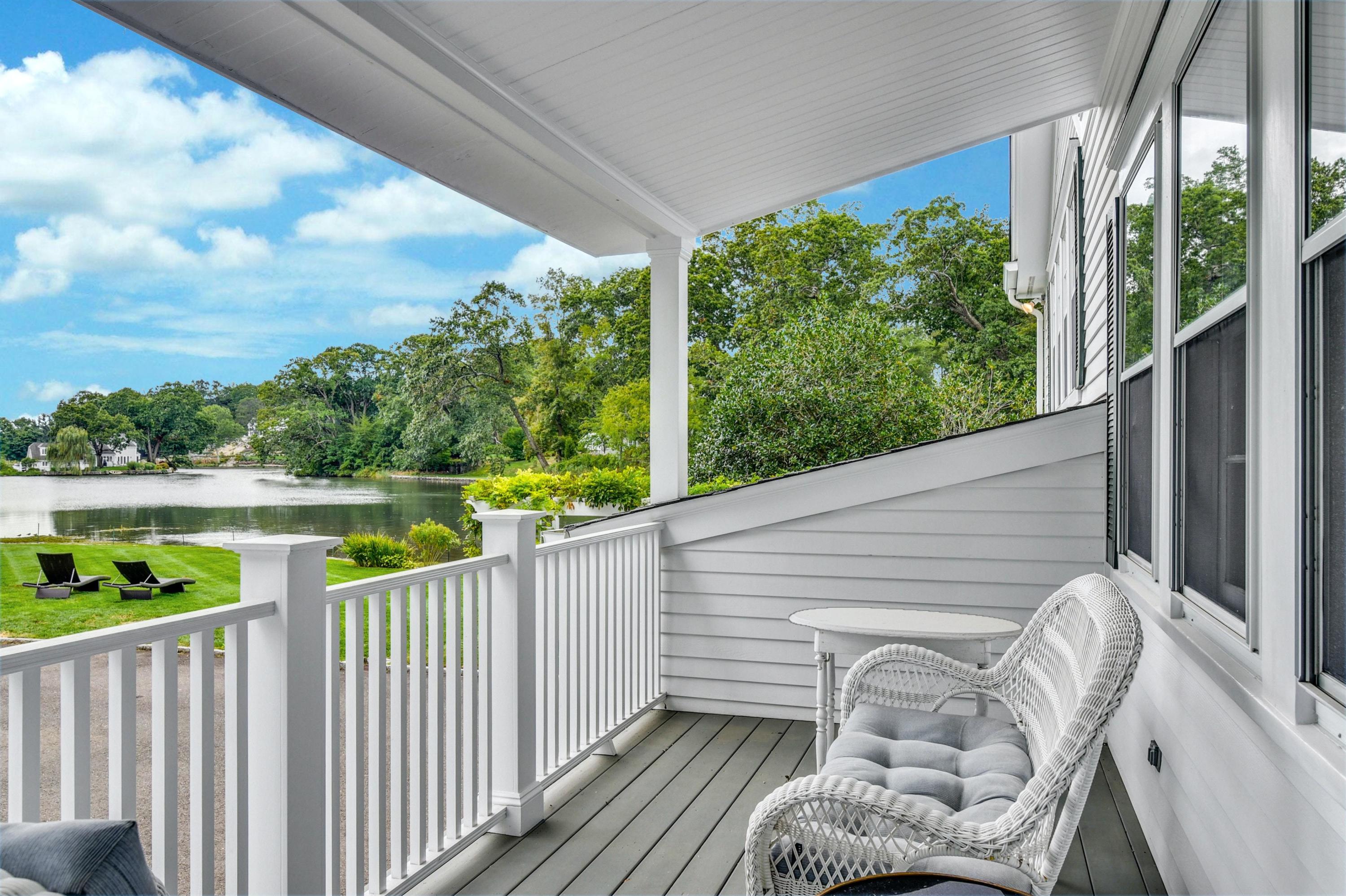 71 Goodwives River Road Darien, CT 06820 - Photo 23 of 39 a view of a balcony with furniture