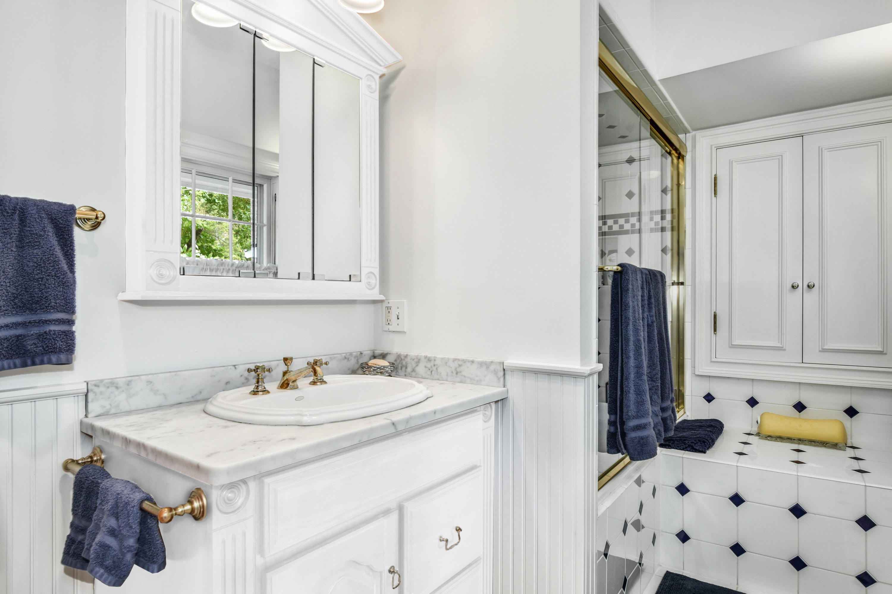 71 Goodwives River Road Darien, CT 06820 - Photo 33 of 39 a bathroom with a sink and a window