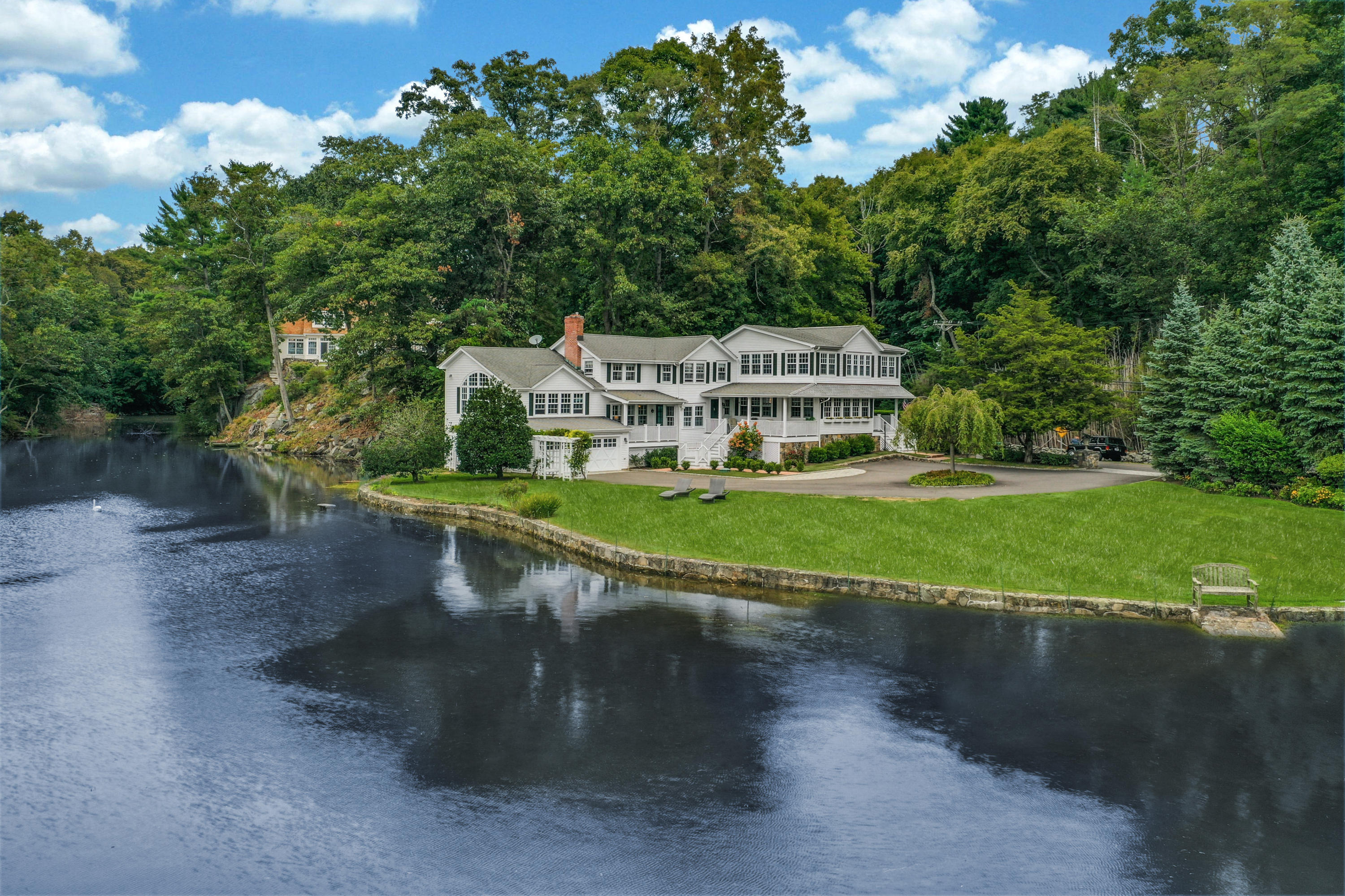 71 Goodwives River Road Darien, CT 06820 - Photo 38 of 39 a view of a house with a yard