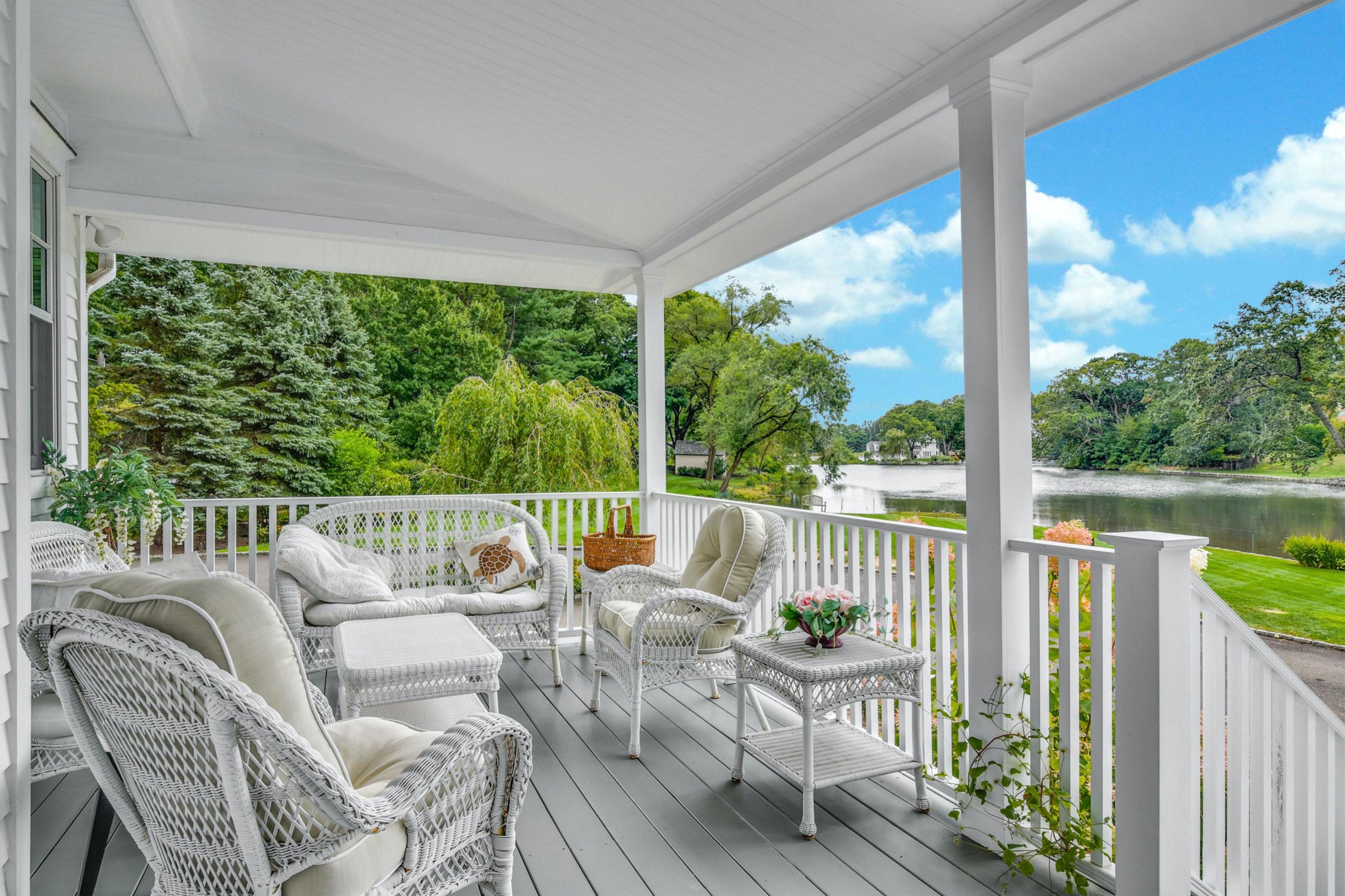71 Goodwives River Road Darien, CT 06820 - Photo 8 of 39 a balcony with furniture and garden view