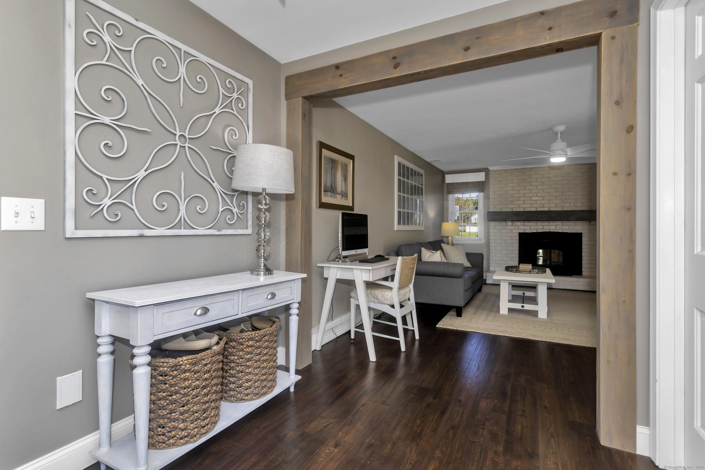 57 Kildeer Lane Suffield, CT 06078 - Photo 14 of 37 a view of a livingroom with furniture and a fireplace